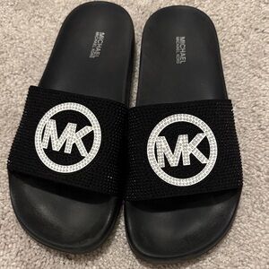 Michael Kors Black Slides with Silver Emblem